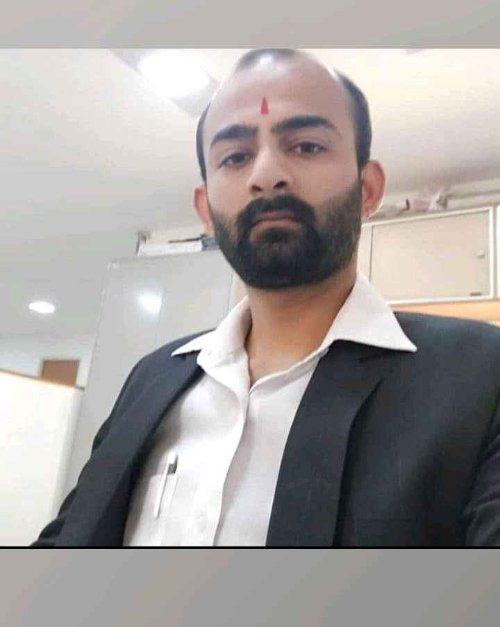 Adv Dharmendra Sharma
